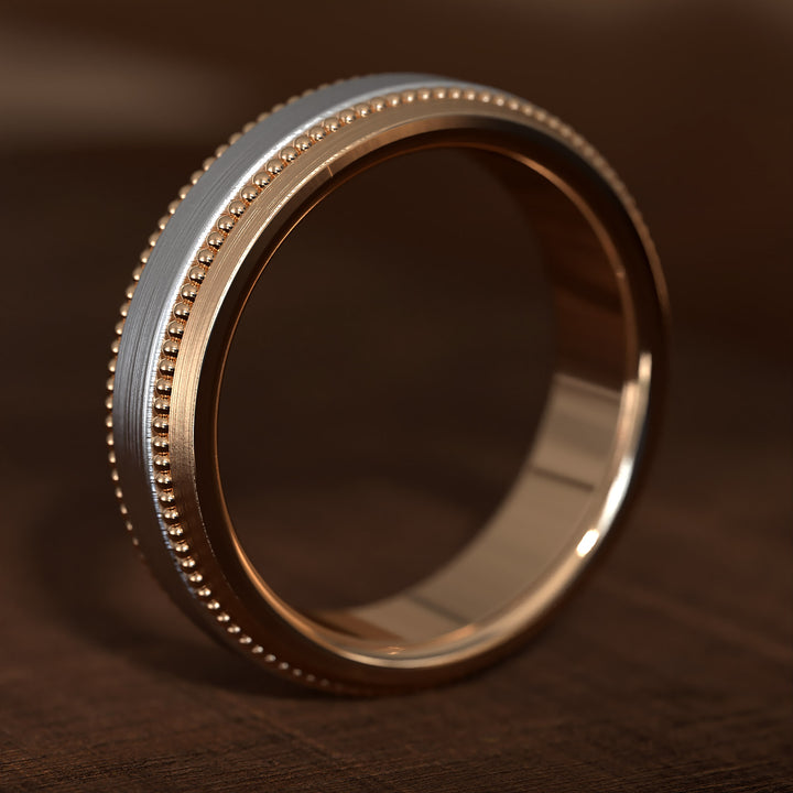Two-tone hammered wedding band with milgrain edges