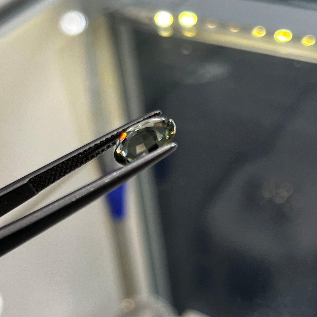 2.09ct unheated oval green sapphire with bluish tone