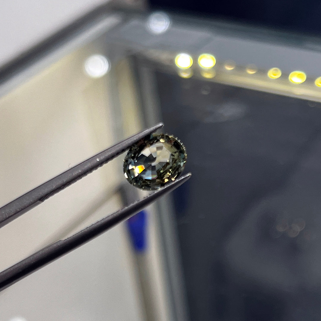 2.09ct unheated oval green sapphire with bluish tone