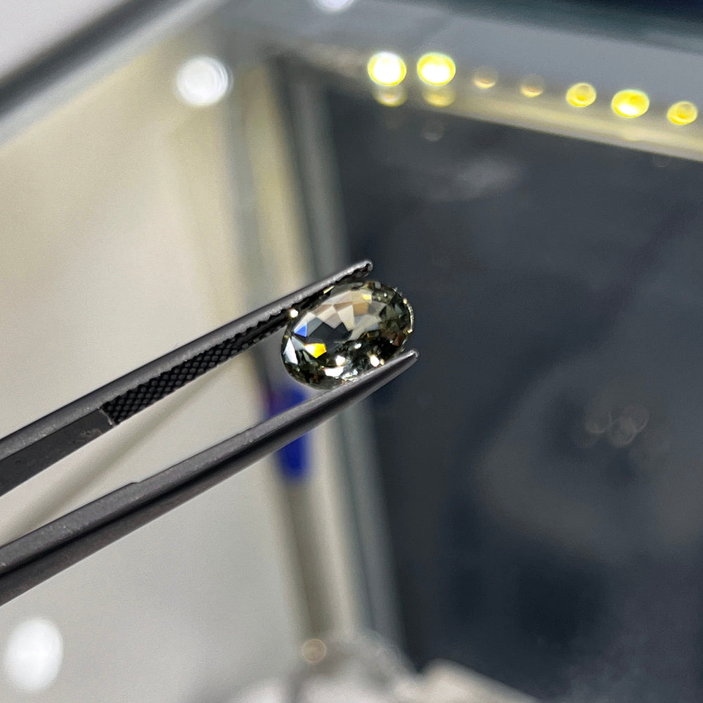 2.09ct unheated oval green sapphire with bluish tone