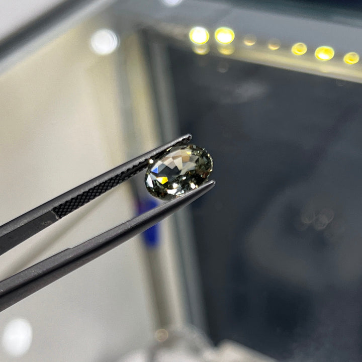 2.09ct unheated oval green sapphire with bluish tone