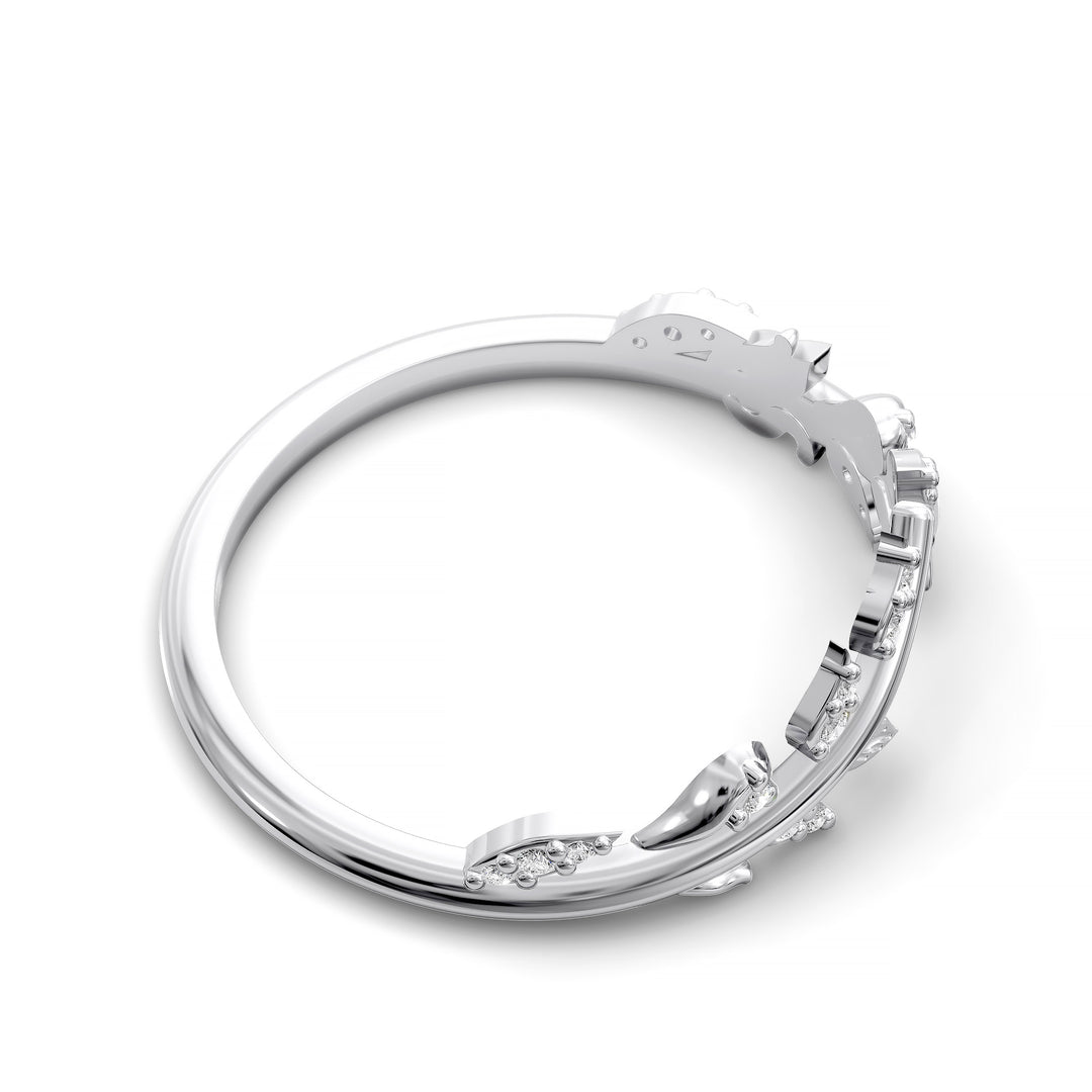 V-shaped nature-inspired wedding band with leaf motifs and round stones
