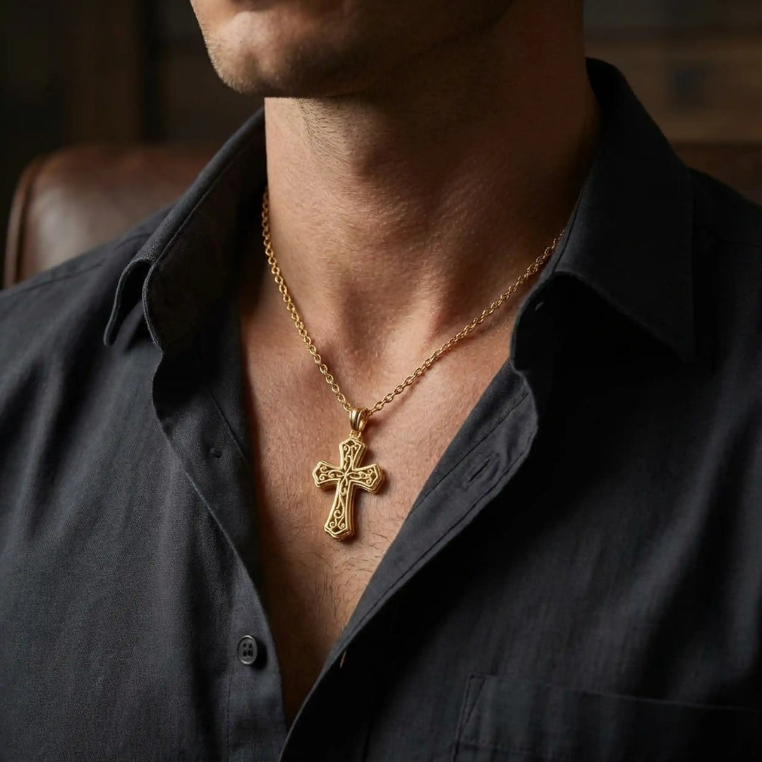 Ornate filigree Latin cross pendant necklace displayed on chest