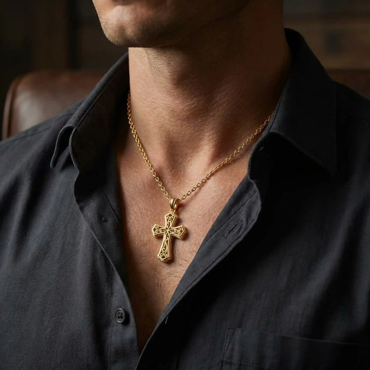 Ornate filigree Latin cross pendant necklace displayed on chest