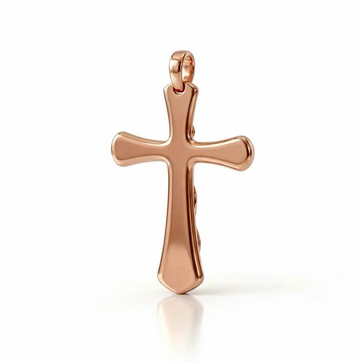 Vine cross pendant with engraved leaf detail displayed on female chest.