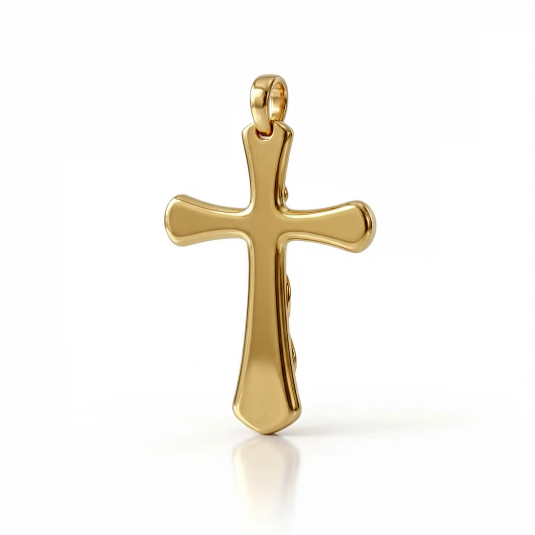 Vine cross pendant with engraved leaf detail displayed on white background.