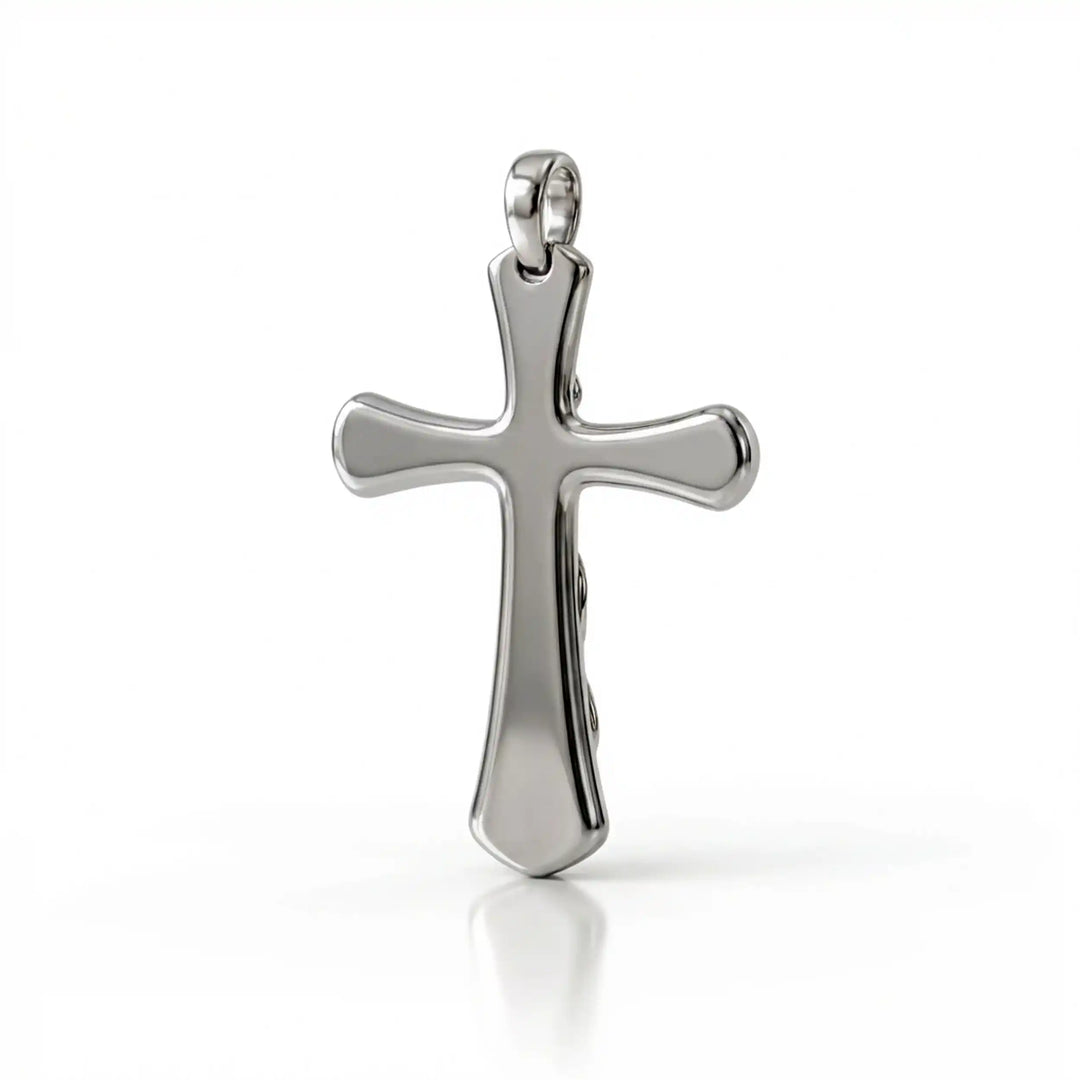 Vine cross pendant with engraved leaf detail displayed on white background.
