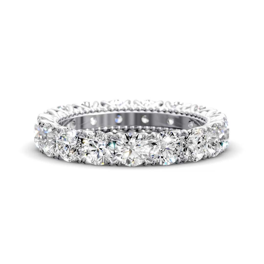 Vintage-inspired eternity band with round cut diamonds and intricate scalloped setting
