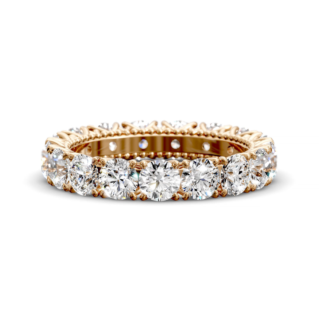 Vintage-inspired eternity band with round cut diamonds and intricate scalloped setting
