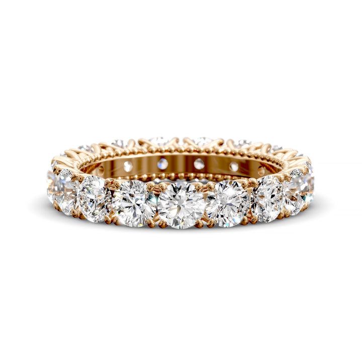 Vintage-inspired eternity band with round cut diamonds and intricate scalloped setting