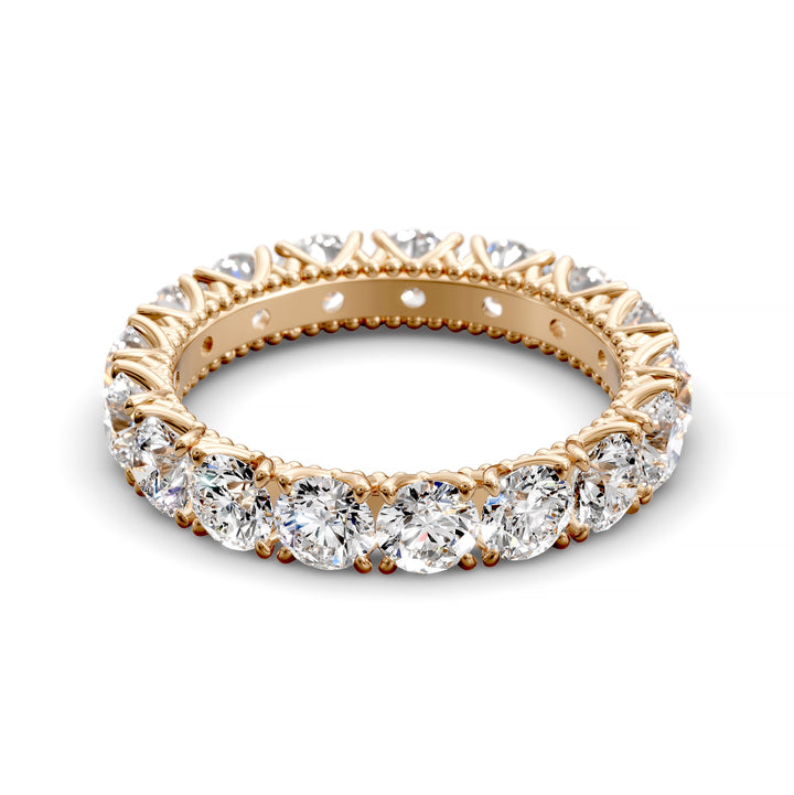 Vintage-inspired eternity band with round cut diamonds and intricate scalloped setting