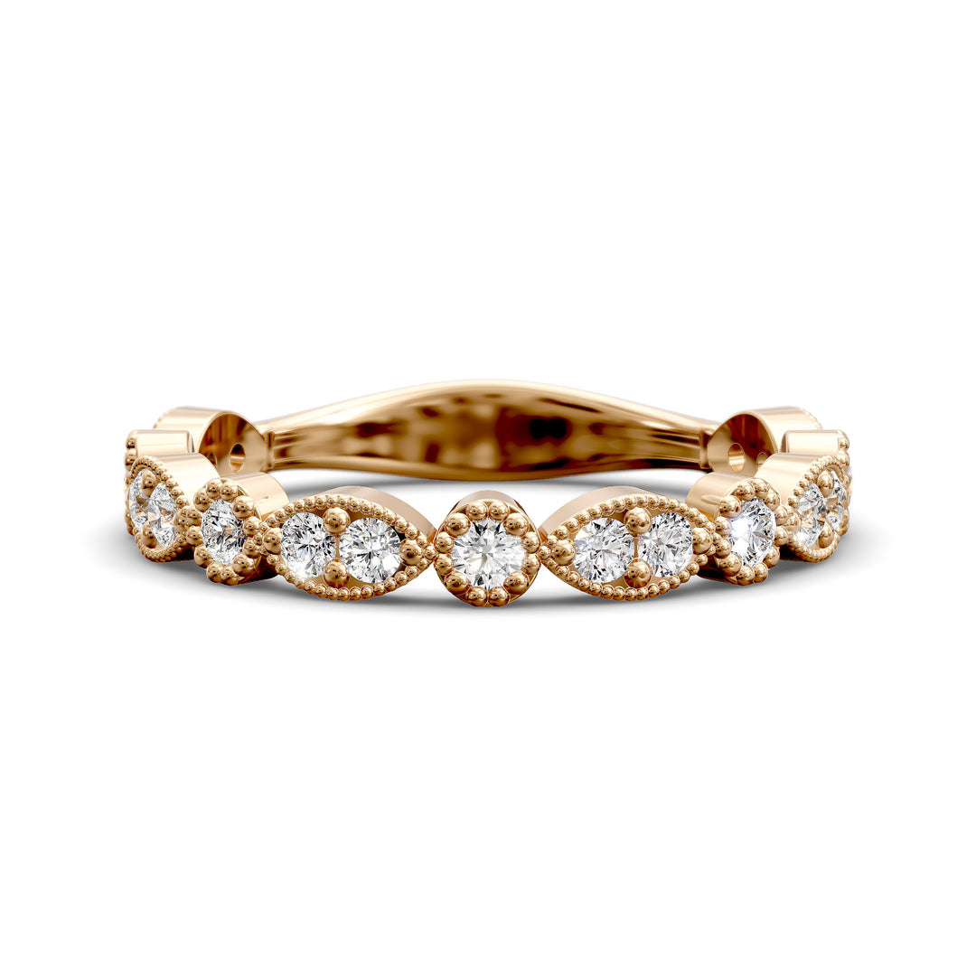 Vintage marquise-shaped diamond wedding band with milgrain detail in gold and platinum options