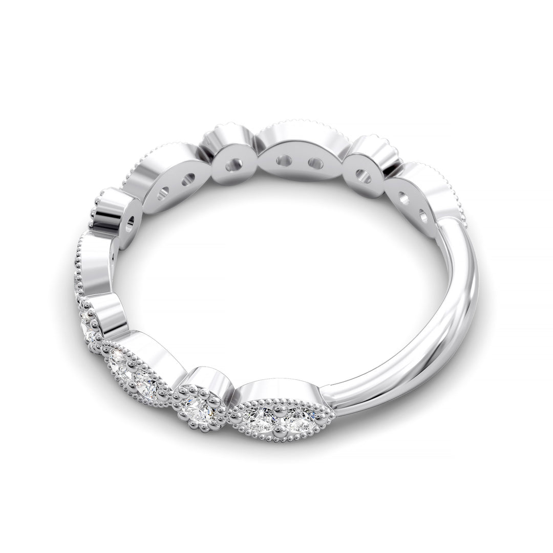 Vintage marquise-shaped diamond wedding band with milgrain detail in gold and platinum options