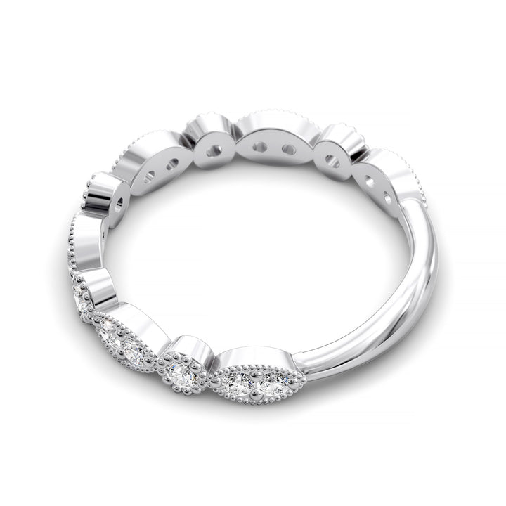 Vintage marquise-shaped diamond wedding band with milgrain detail in gold and platinum options