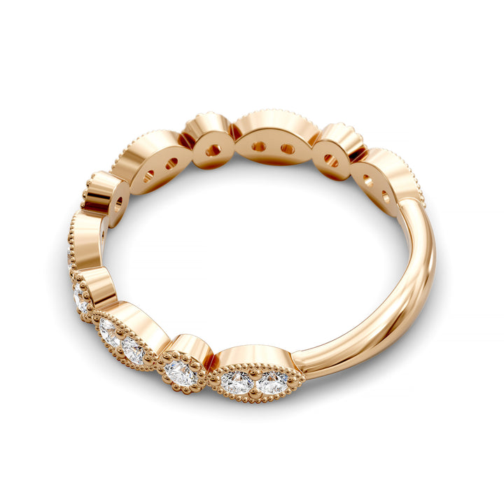 Vintage marquise-shaped diamond wedding band with milgrain detail in gold and platinum options