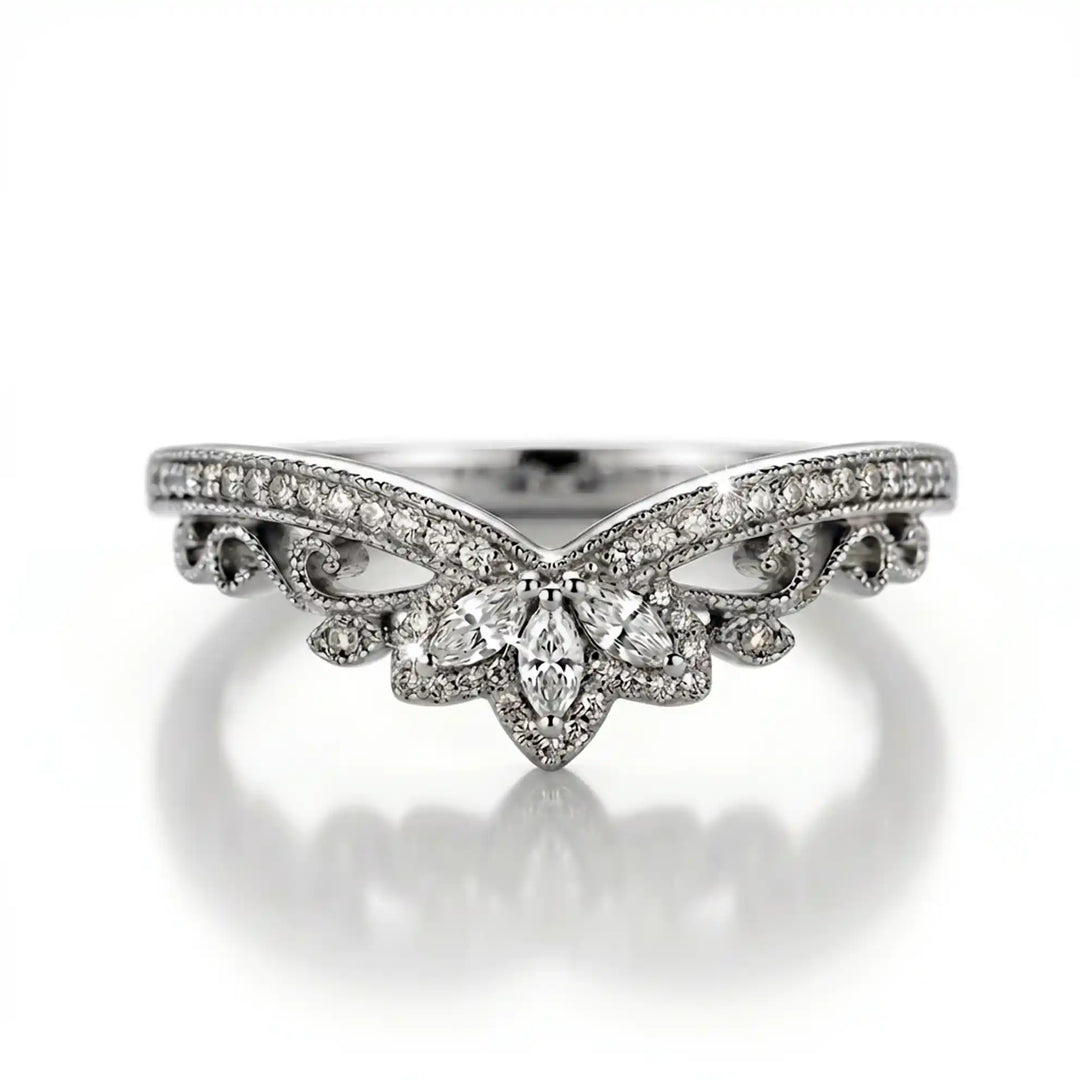 Vintage marquise floral lab-grown diamond wedding band with pavé accents on white background.