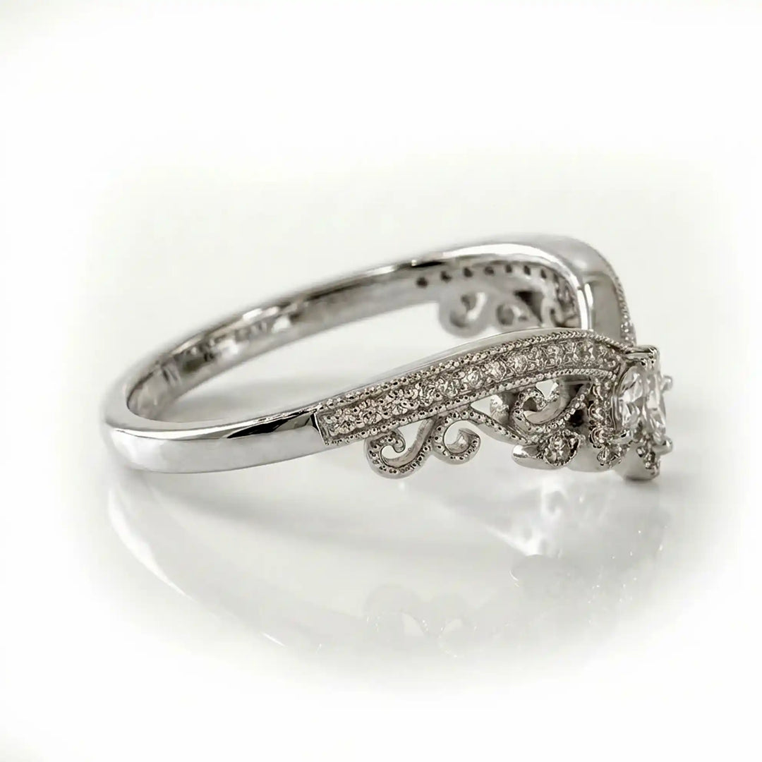 Vintage marquise floral lab-grown diamond wedding band with pavé accents on white background.