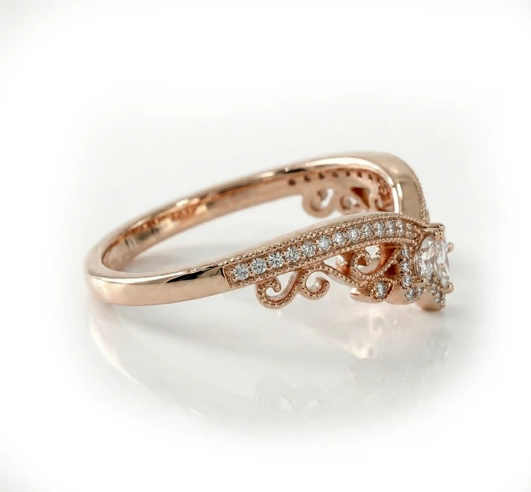 Vintage marquise floral lab-grown diamond wedding band with pavé accents on white background.
