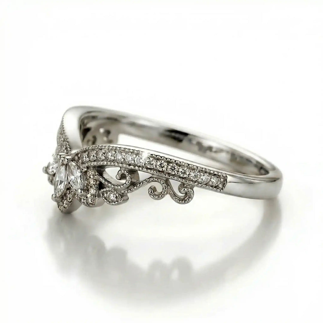 Vintage marquise floral lab-grown diamond wedding band with pavé accents on white background.