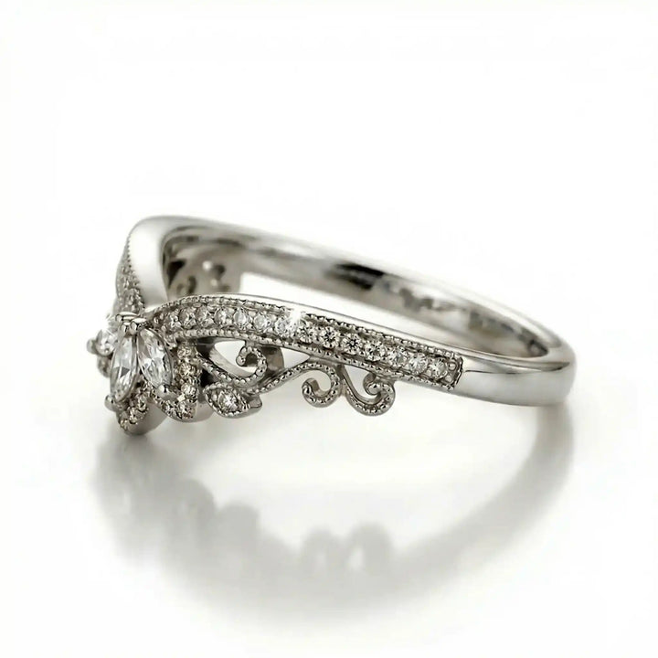 Vintage marquise floral lab-grown diamond wedding band with pavé accents on white background.