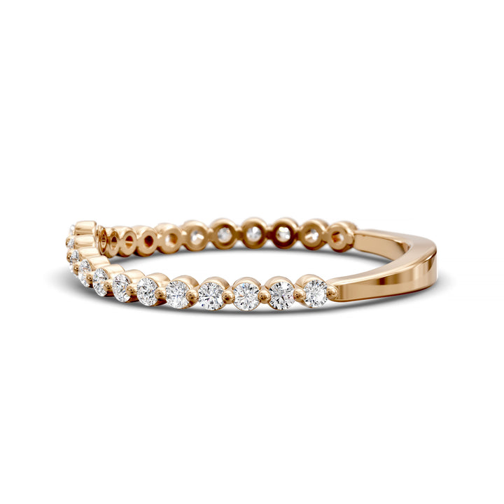 V-shaped gold diamond band with shared prong round stones in a wishbone contour