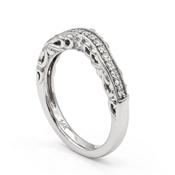 Vintage contour 14k white gold diamond wedding band, three-quarter view with filigree