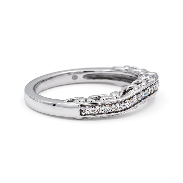 Vintage contoured diamond wedding band in 14k white gold, elevated three-quarter view