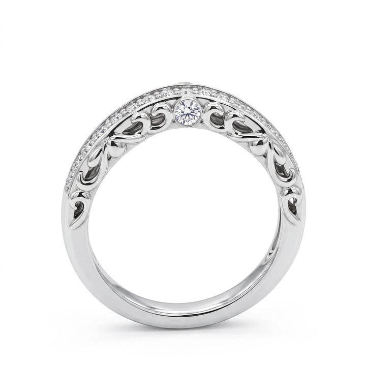 Profile of vintage contour diamond wedding band in 14k white gold with side bezels